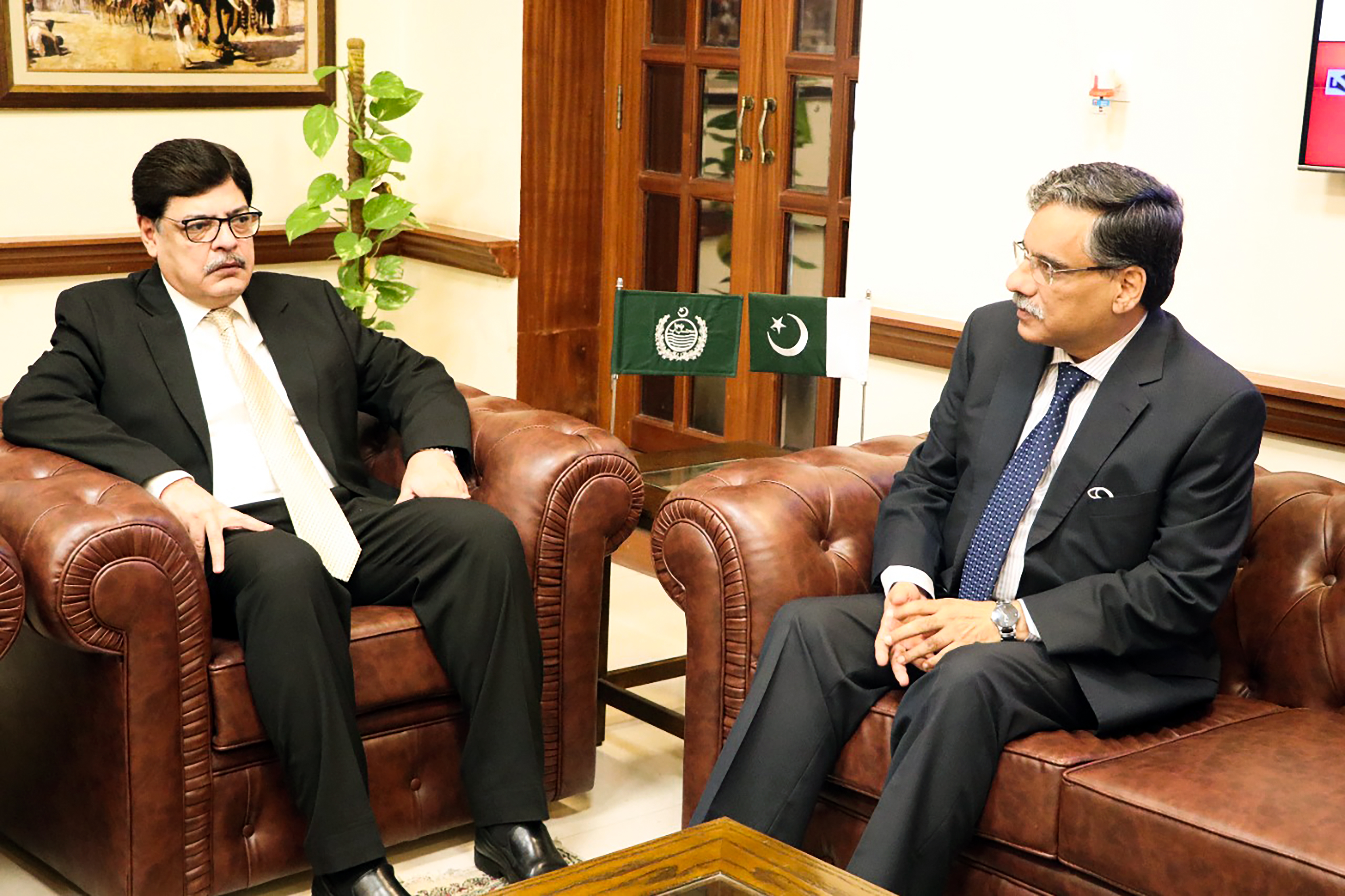 The Federal Ombudsman, Syed Tahir Shahbaz discussing on awareness drive with Provincial Ombudsman Punjab, Mr. Azam Suleman while visiting  his office at Lahore on 3rd October 2021.